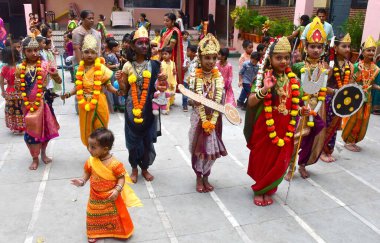 MUMBAI INDIA OCTOBER 5 2024 M S K Prathmik Vidyalaya school girls dressed as nine different goddesses on the occasion of Navratri festival in the school at Chunabhatti on October 5 2024 in Mumbai India Navratri is a festival that symbolizes the femin clipart