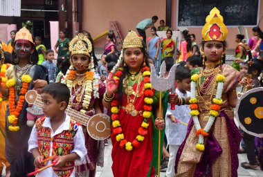 MUMBAI INDIA OCTOBER 5 2024 M S K Prathmik Vidyalaya school girls dressed as nine different goddesses on the occasion of Navratri festival in the school at Chunabhatti on October 5 2024 in Mumbai India Navratri is a festival that symbolizes the femin clipart