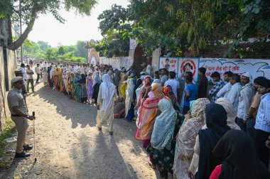 GURUGRAM INDIA OCTOBER 5 2024 Women voters wait outside a polling booth to cast their votes during the Haryana Assembly Election at Raipur village in Nuh Mewat on October 5 2024 in Gurugram India A total of 1 031 candidates are contesting in all 90 a clipart