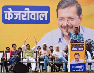 NEW DELHI INDIA OCTOBER 6 2024 Delhi CM Atishi with AAP National Convener Arvind Kejriwal and Party leaders during the public meeting Janta Ki Adalat to engage with the people at Chhatrasal Stadium on October 6 2024 in New Delhi India Kejriwal Sunday clipart