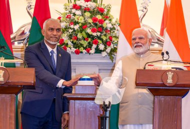 NEW DELHIINDIA OCTOBER 7 2024 Prime Minister Narendra Modi and President of Maldives Mohamed Muizzu virtually inaugurate the new runway at the Hanimaadhoo International Airport Maldives during a joint press statement after a meeting at Hyderabad Hous clipart