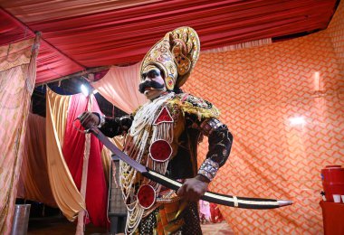 NOIDA INDIA OCTOBER 5 2024 Ravana King of Rakshasa doing makeup and waiting for their performance in the backstage Ramlila Maidan Sector 21A on October 5 2024 in Noida India Photo by Sunil Ghosh/Hindustan Times clipart