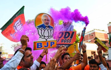 NEW DELHI INDIA OCTOBER 8 2024 BJP supporters celebrate at BJP HQ after assembly election results on October 8 2024 in New Delhi India The ruling BJP secured a historic third term in Haryana winning 48 seats and halting a Congress comeback in the sta clipart