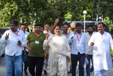 GURUGRAM INDIA OCTOBER 8 2024 Bimla Chaudhary Bharatiya Janata Party candidate from Pataudi seat won by 46530 votes in Haryana Assembly Election arrive at vote counting centre at Government Girls College sector 14 on October 8 2024 in Gurugram India  clipart