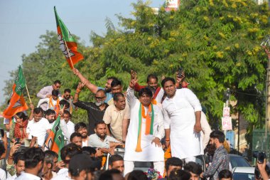 GURUGRAM INDIA OCTOBER 8 2024 Mukesh Sherma Bharatiya Janata Party candidate from Gurugram seat win the election of 68045 vote in Haryana Assembly Election held a road show at Old Delhi Road near Government Girls College sector 14 on October 8 2024 i clipart