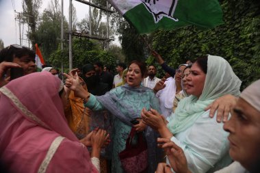 SRINAGAR INDIA OCTOBER 8 2024 Supporters of Indian National Congress INC celebrate outside the counting center on October 8 2024 in Srinagar India National Conference Congress alliance has achieved victory in the Assembly polls winning a total of 48  clipart