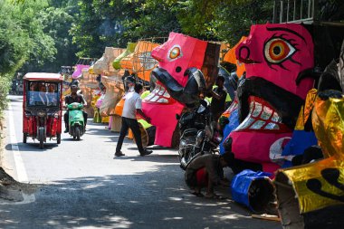 NEW DELHI INDIA OCTOBER 9 2024 Ravan effigies showcased for sale ahead of Dussehra festival at famous Tagore Garden road on October 9 2024 in New Delhi India Photo by Salman Ali Hindustan Times  clipart