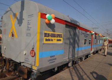 NEW DELHI INDIA OCTOBER 9 2024 Member of Parliament Godda constituency in Jharkhand Nishikant Dubey Along with North East Delhi Member of Parliament Manoj Tiwari DRM Delhi Sukhwinder Singh flag off the new train service 14050 14049 Delhi Junction to  clipart