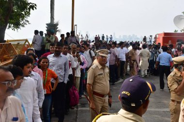 MUMBAI INDIA OCTOBER 10 2024 Visitors in que to pay their last respects to Indian Industrialist Ratan Tata outside the National Centre for the Performing Arts NCPA to pay their respects ahead of its cremation at Marine Drive on October 10 2024 in Mum clipart