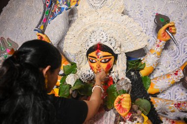 NOIDA INDIA OCTOBER 13 2024 Women apply sindoor or vermilion on each others faces during Sindoor Khela on the final day of the Durga Puja at Kali Bari Mandir Sector 26 on October 13 2024 in Noida India Photo by Sunil Ghosh Hindustan Times clipart