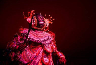 NOIDA INDIA OCTOBER 13 2024 A group of artists performs Purulia Chhau folk dance during last day Durga Puja celebrations last night at Kali Bari in Sector 26 on October 13 2024 in Noida India Photo by Sunil Ghosh Hindustan Times clipart