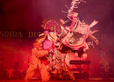 NOIDA INDIA OCTOBER 13 2024 A group of artists performs Purulia Chhau folk dance during last day Durga Puja celebrations last night at Kali Bari in Sector 26 on October 13 2024 in Noida India Photo by Sunil Ghosh Hindustan Times clipart