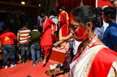 NEW DELHI INDIA OCTOBER 13 2024 Devotees participate during Sindoor Khela on the last day of Durga Puja proceed with immersion of Lord Durga Maa at Kali Temple CR Park on October 13 2024 in New Delhi India Photo by Salman Ali Hindustan Times clipart