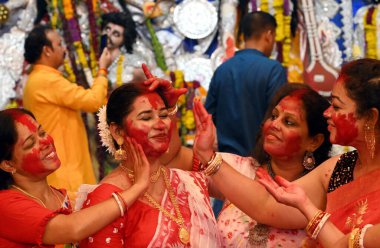 NEW DELHI INDIA OCTOBER 13 2024 Women apply vermillion on each other as they participate in at a Puja pandal to mark the end of the Durga Puja festival at Aram Bagh on October 13 2024 in New Delhi India Photo by Arvind Yadav Hindustan Times clipart