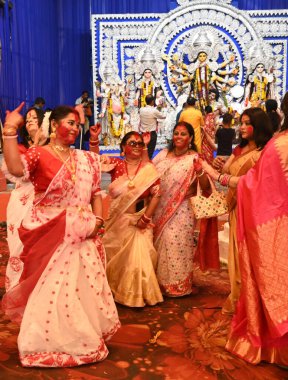 NEW DELHI INDIA OCTOBER 13 2024 Women apply vermillion on each other as they participate in at a Puja pandal to mark the end of the Durga Puja festival at Aram Bagh on October 13 2024 in New Delhi India Photo by Arvind Yadav Hindustan Times clipart