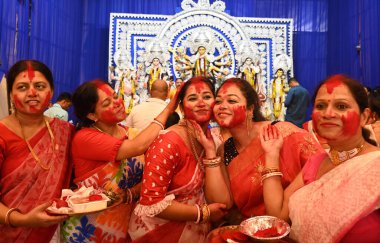 NEW DELHI INDIA OCTOBER 13 2024 Women apply vermillion on each other as they participate in at a Puja pandal to mark the end of the Durga Puja festival at Aram Bagh on October 13 2024 in New Delhi India Photo by Arvind Yadav Hindustan Times clipart