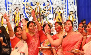 NEW DELHI INDIA OCTOBER 13 2024 Women apply vermillion on each other as they participate in at a Puja pandal to mark the end of the Durga Puja festival at Aram Bagh on October 13 2024 in New Delhi India Photo by Arvind Yadav Hindustan Times clipart