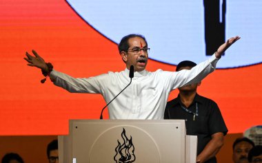 MUMBAI INDIA OCTOBER 12 2024 Uddhav Thackeray the chief of Shiv Sena UBT addresses party workers during the Dussehra rally at Shivaji Park Dadar on October 12 2024 in Mumbai India Ahead of the Assembly polls Shiv Sena UBT chief Uddhav Thackeray criti clipart