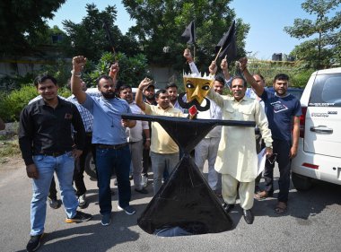 NEW DELHI INDIA OCTOBER 15 2024 Members from Delhi Taxi Tourists Transporters and Tour operators Association protests against the Delhi Transport Department for their various demands at Mata Sundari College on October 15 2024 in New Delhi India Photo clipart