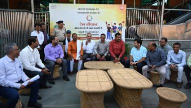 NEW DELHI INDIA OCTOBER 15 2024 DRM Sukhwinder Singh with other railway officers and passengers participate in Swachhta Hi Seva campaign during Railway Chopal in Delhi Division Northern Railway at New Delhi Railway Station Ajmeri Gate side on October clipart