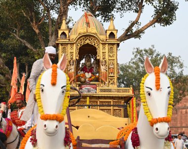 NEW DELHI INDIA OCTOBER 17 2024 Devotes joined the grand chariot procession Valmiki Pragat Diwas and Shobha Yatra organized at Red Fort under the aegis of Valmiki Chaudhary Sarpanch Committee and Pragototsav Committee at Red Fort Park on October 17 2 clipart