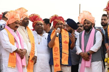 NEW DELHI INDIA OCTOBER 17 2024 National convener of the Aam Aadmi Party Arvind Kejriwaland other his Party Leader joined the grand chariot procession Valmiki Pragat Diwas and Shobha Yatra organized at Red Fort under the aegis of Valmiki Chaudhary Sa clipart