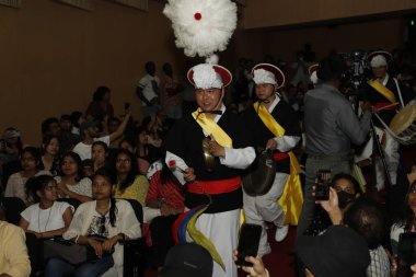 NEW DELHI INDIA MAY 23 2023 Students from South Korea perform traditional dance during the Indo Korean culture and camaraderie at Kamani Auditorium Mandi House on May 23 2023 in New Delhi India Dressed in colorful attires Korean and Indian artistes t clipart