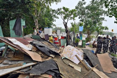 NEW DELHI INDIA JUNE 1 2023 Residents attempt to salvage their belongings after an anti encroachment drive at Bhairon Marg near Pragati Maidan on June 1 2023 in New Delhi India The government s public works department PWD on Thursday morning started  clipart