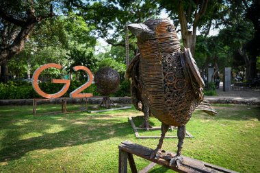 NEW DELHI, INDIA: JUNE 4 2023 - Birds and animals made from scrap metal seen placed inside a park ahead of the preparations for G20 Summit at Chanakyapuri.  clipart