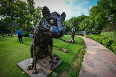 NEW DELHI, INDIA: JUNE 4 2023 - Birds and animals made from scrap metal seen placed inside a park ahead of the preparations for G20 Summit at Chanakyapuri.  clipart