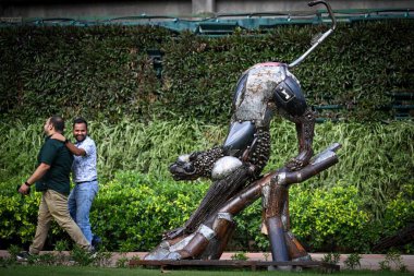 NEW DELHI, INDIA: JUNE 4 2023 - Birds and animals made from scrap metal seen placed inside a park ahead of the preparations for G20 Summit at Chanakyapuri.  clipart