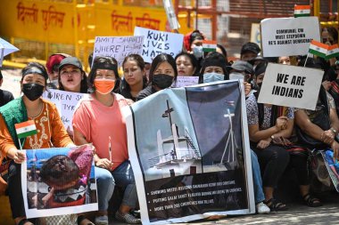 NEW DELHI INDIA JUNE 7 2023 Women from the Kuki Tribe community held banners seeking justice for the alleged violence against Kuki Zomi people in Manipur at Jantar Mantar on June 7 2023 in New Delhi India Photo by Sanchit Khanna Hindustan Times clipart