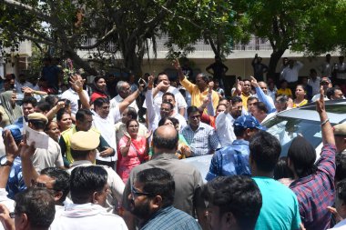 NEW DELHI INDIA JUNE 8 2023 BJP party workers and supporters shouting slogans against Delhi CM Arvind Kejriwal outside the new campus of the Guru Gobind Singh Indraprastha University GGSIPU during the inauguration of the new campus of the Guru Gobind clipart