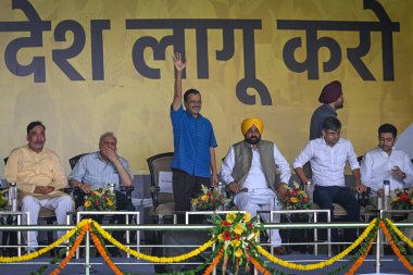 NEW DELHI INDIA JUNE 11 2023 Arvind Kejriwal Chief Minister of Delhi along with Bhagwant Mann Chief minister of Punjab arrives during the mega rally organized at Delhi s Ramlila Maidan against the Centre s Ordinance on control over administrative ser clipart