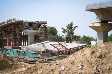 NEW DELHI INDIA JUNE 14 2023 A view of the slab of under constructed Dwarka expressway that fell on a JCB operator resulting in his death at NH8 near Rajokri on June 14 2023 in New Delhi India Photo by Sanchit Khanna Hindustan Times clipart