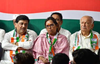 MUMBAI INDIA JUNE 15 2023 MLA Varsha Gaikwad take charge as President Mumbai Regional Congress committee MRCC from her predecessor Bhai Jagtap in the presence of senior Congress leaders Sushil Kumar Shinde Ashok Chavan Prithviraj Chavan Naseem Khan a clipart