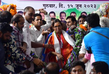 MUMBAI INDIA JUNE 15 2023 MLA Varsha Gaikwad take charge as President Mumbai Regional Congress committee MRCC from her predecessor Bhai Jagtap in the presence of senior Congress leaders Sushil Kumar Shinde Ashok Chavan Prithviraj Chavan Naseem Khan a clipart