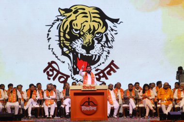 MUMBAI INDIA JUNE 19 2023 Maharashtra CM Eknath Shinde addresses a rally during the Shiv Sena 57th Foundation Day at Nesco Goregaon on June 19 2023 in Mumbai India In June 19 1966 when the late Bal Thackeray founded the Shiv Sena it was a clarion cal clipart