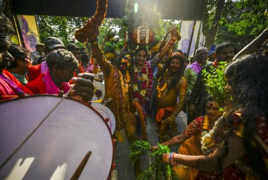 NEW DELHI INDIA JUNE 20 2023 People of Telangana celebrating and dancing during the Lal Darwaza Bonalu celebrations at Telangana Bhawan on June 20 2023 in New Delhi India Bonalu is celebrated usually during Ashada Masam which falls in July August Spe clipart