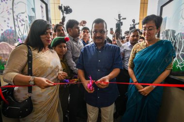 NEW DELHI INDIA JUNE 26 2023 Arvind Kejriwal Chief Minister of Delhi along with Atishi Education Minister of Delhi during the inauguration of a newly constructed School by Delhi Government at Sarvodaya Co Ed School Libaspur on June 26 2023 in New Del clipart