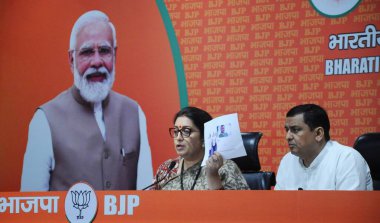 NEW DELHI INDIA JUNE 28 2023 Union Minister for Women and Child Development and BJP leader Smriti Irani addresses a press conference against Rahul Gandhi s United States visit at BJP HQ on June 28 2023 in New Delhi India Smriti Irani doubled down on  clipart