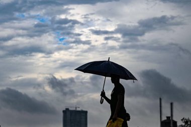 NEW DELHI INDIA JUNE 29 2023 Commuters out on a rainy day at Kirti Nagar on June 29 2023 in New Delhi India Photo by Sanchit Khanna Hindustan Times clipart