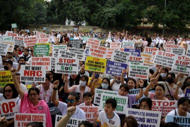 NEW DELHI INDIA: JUNE 4 2023 - Meitei community people on Protest at Jantar Mantar against the violence that is ongoing in Manipur on June 4 2023 in New Delhi India.  clipart