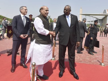 NEW DELHI INDIA JUNE 5 2023 Union Defence Minister of India Rajnath Singh hand shake with US Secretary of Defence Lloyd Austin during the inspect Tri Service Guard of Honour at Manekshaw Centre Delhi Cantt on June 5 2023 in New Delhi India Photo by S clipart