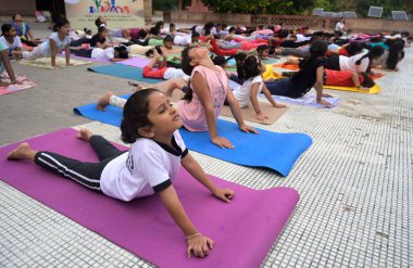 LUCKNOW INDIA JUNE 21 2023 Sudents of Sangeet Natak Adedemy participating in Yoga event on the occasion of International Yoga Day at Sangeet Natak acedemy on June 21 2023 in Lucknow India Photo by Deepak Gupta Hindustan Times clipart