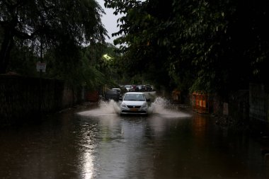 NEW DELHI INDIA JUNE 25 2023 Waterlogged at Gaffar Manzil road near Jamia Millia Islamia after heavy rainfall overnight on June 25 2023 in New Delhi India Heavy rainfall accompanied by lightning lashed several parts of the national capital Delhi and  clipart