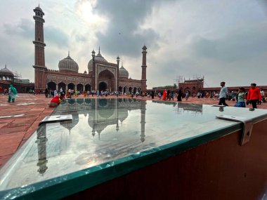 NEW DELHI INDIA JUNE 25 2023 As monsoon arrives clouds over the Delhi iconic Jama Masjid can be seen during evening hours on June 25 2023 in New Delhi India Heavy rainfall accompanied by lightning lashed several parts of the national capital Delhi an clipart