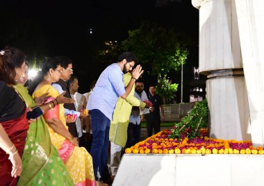 MUMBAI INDIA MAY 1 2023 Former Maharashtra CM Uddhav Thackeray along with Shivsena UBT legislator Aaditya Thackeray and others paid tribute to those who sacrificed their lives during the Samyukta Maharashtra Movement at Hutatma Chowk Fort on May 1 20 clipart