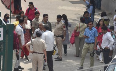 NEW DELHI INDIA APRIL 26 2023 Delhi Police Bomb Detection Team searching after receiving a bomb threat at Delhi Public School DPS Mathura Road on April 26 2023 in New Delhi India A 16 year old teenager who sent the hoax bomb mail to Delhi Public Scho clipart