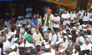 NEW DELHI INDIA MAY 2 2023 Bharatiya Kisan Union BKU leader Rakesh Tikait with wrestlers Bajrang Punia, Vinesh Phogat, Sangita Phogat and others during the protest dharna against the Wrestling Federation of India  clipart